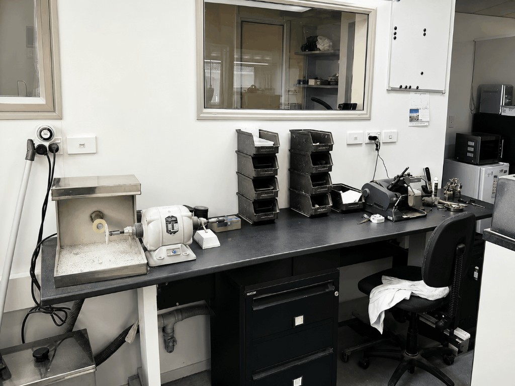 Yu Dental Laboratory workshop with benches and equipment