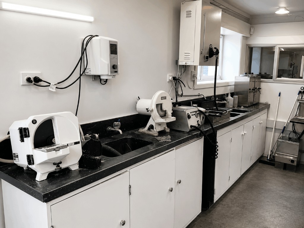 Dental laboratory work area with tools and storage